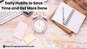 Clean desk with clock and planner for time management.